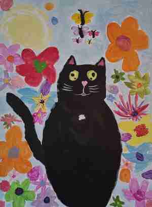 Esmee van Woensel 7 jaar Truffel in een bloemenveld in de lente Kat en bakkie Utrecht